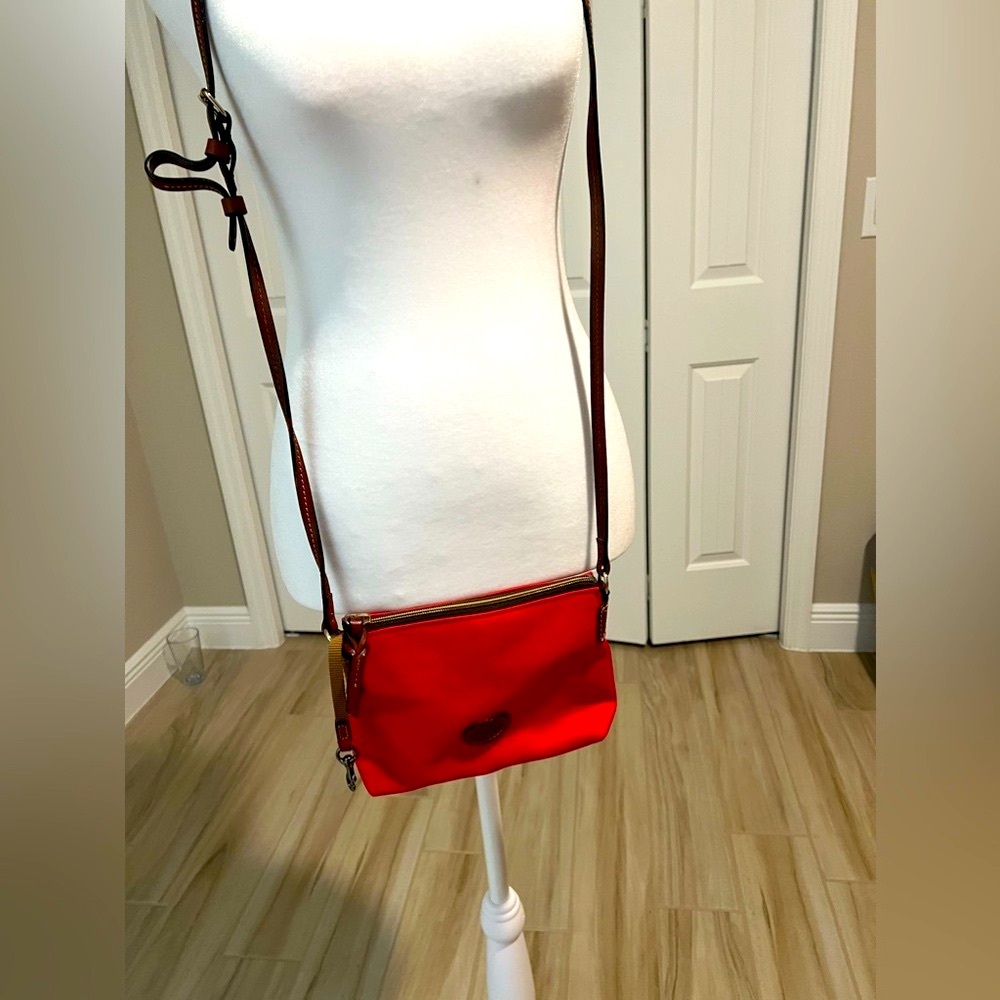 8 inches long by 6 inches deep cute red purse